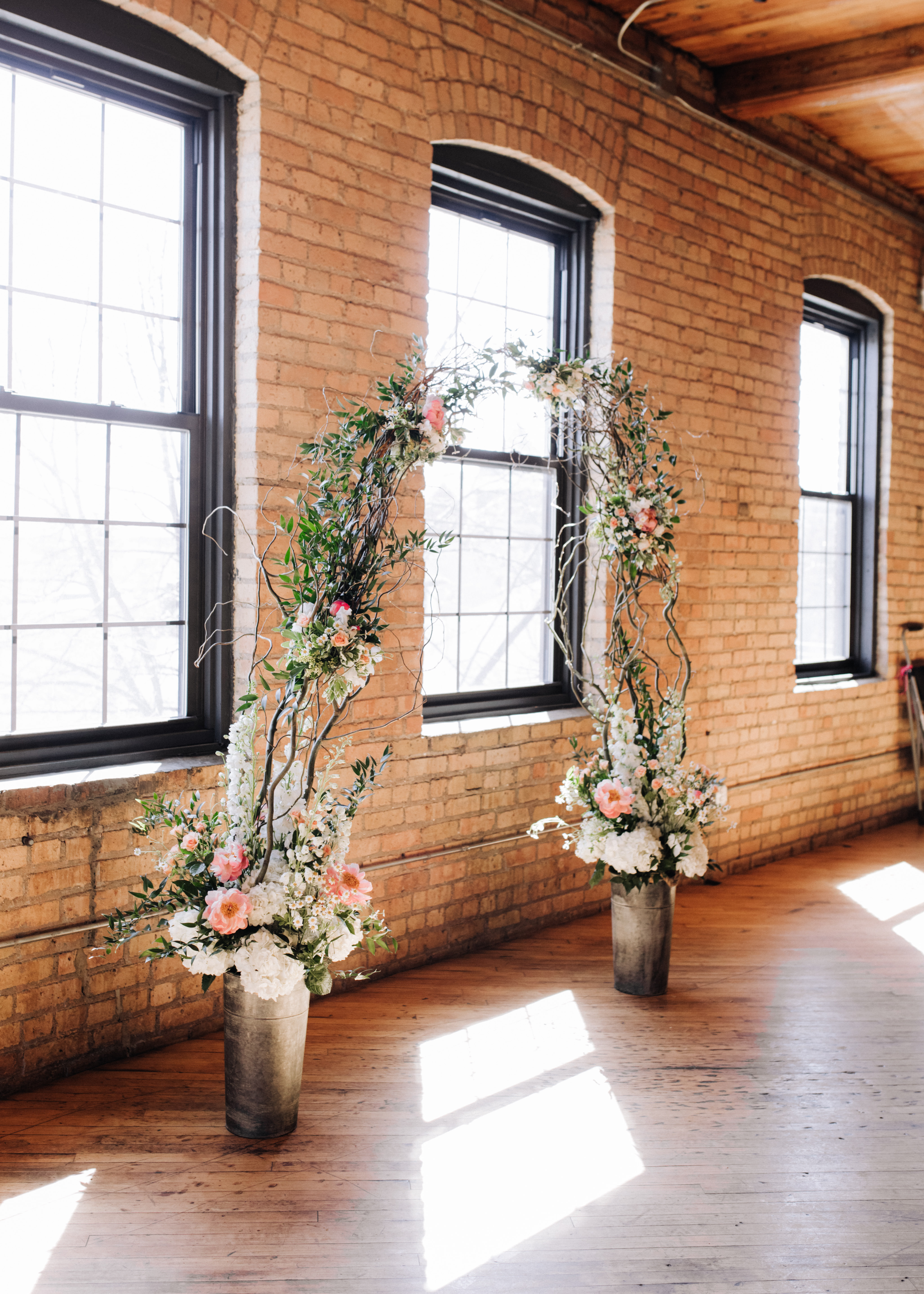 beautiful vine arch with pink and white florals 