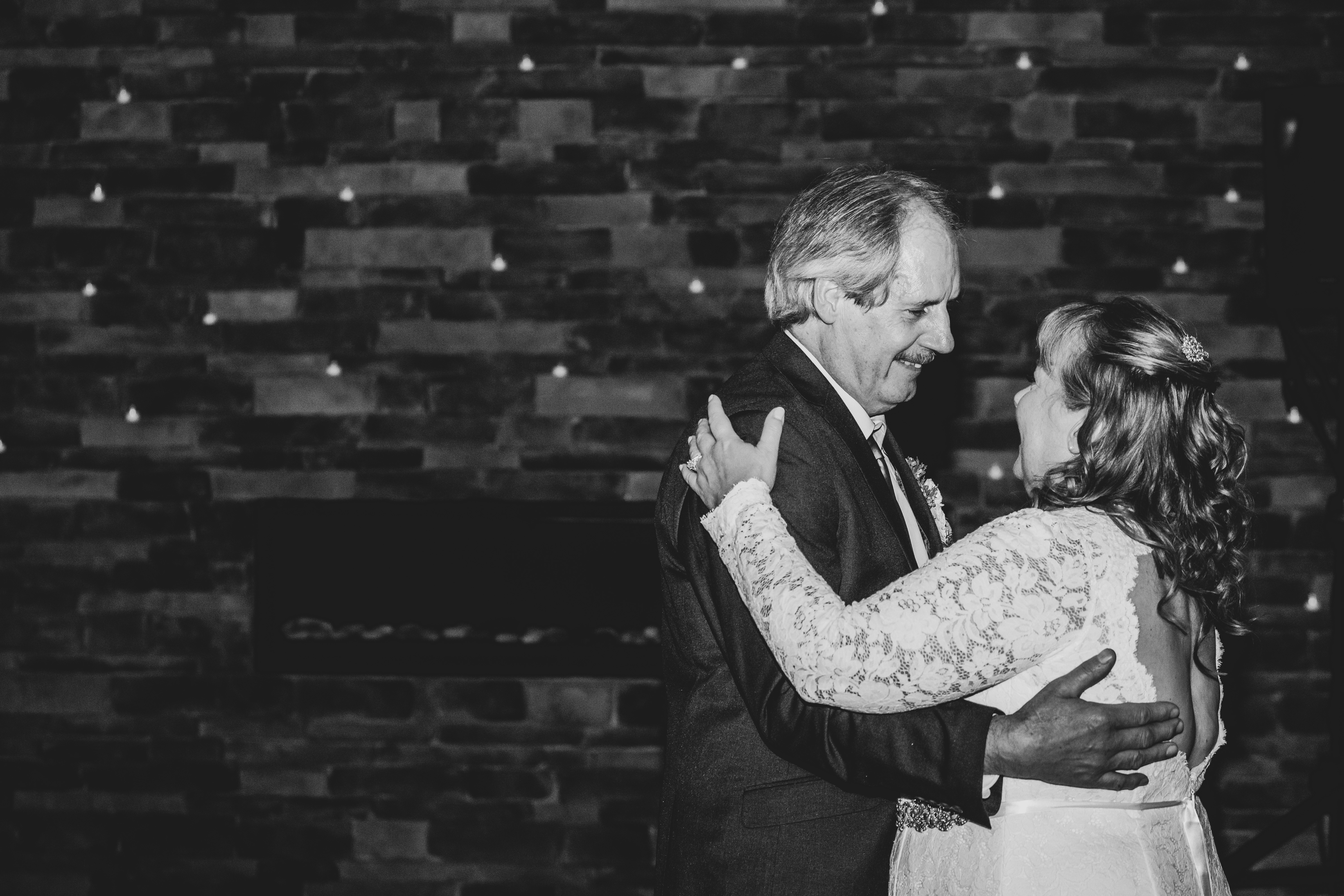 Intimate cozy wedding - first dance by fireplace