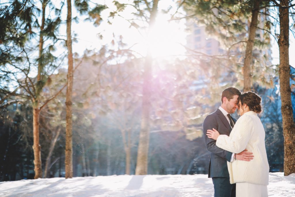 sunny winter wedding bride and groom portrait outside