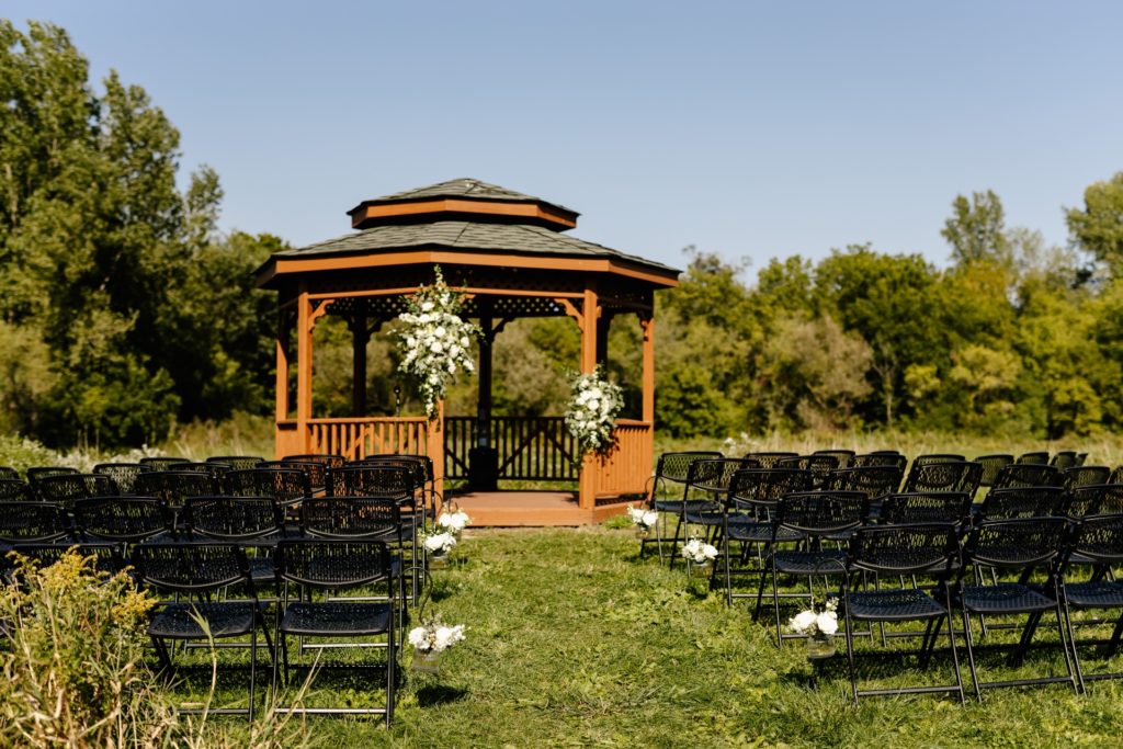 ceremony site pavilion with floral installations