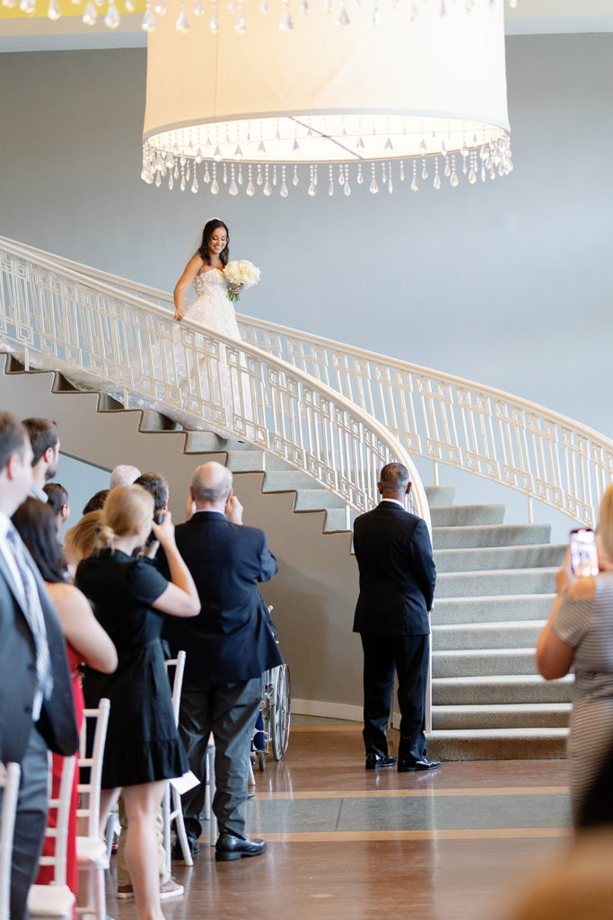 bride grand entrance on staircase