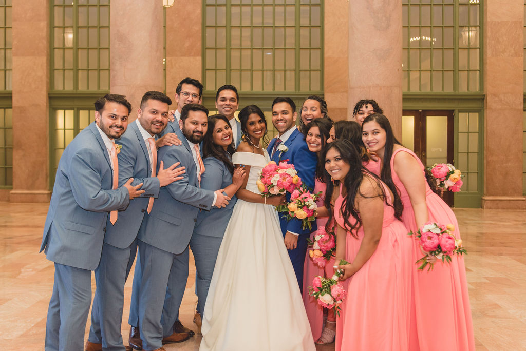 wedding party colorful bouquets, pink dresses, blue suits