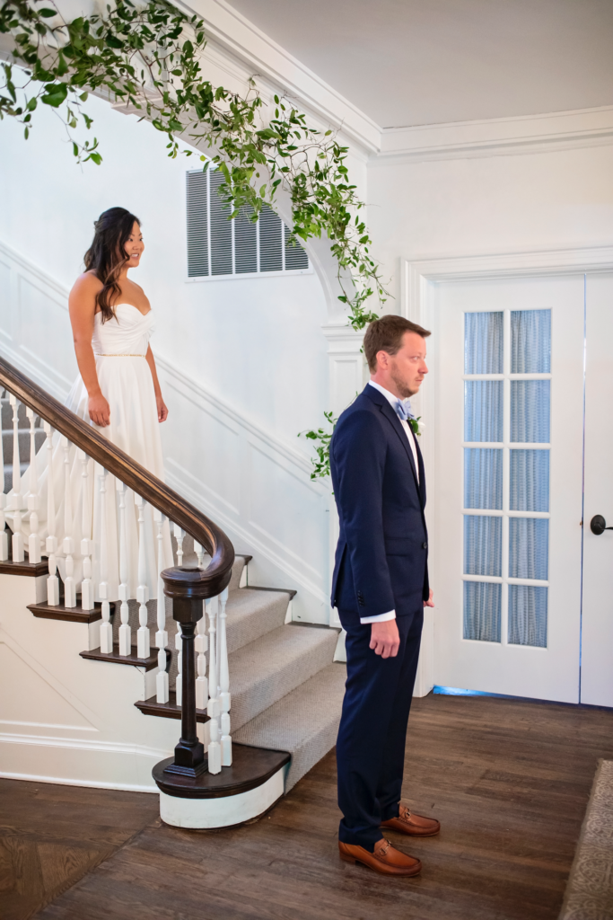 bride first look with groom Blaisdell staircase