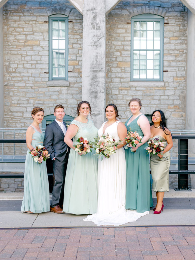 bridesmaids and bridesman green wedding attire