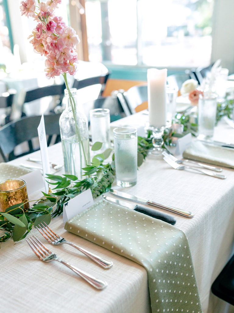 green and peach wedding color scheme table decor aster cafe wedding