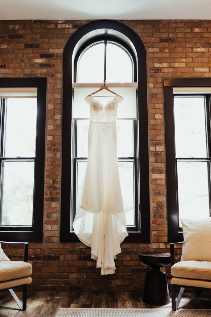 wedding-dress-hanging-window-silhouette