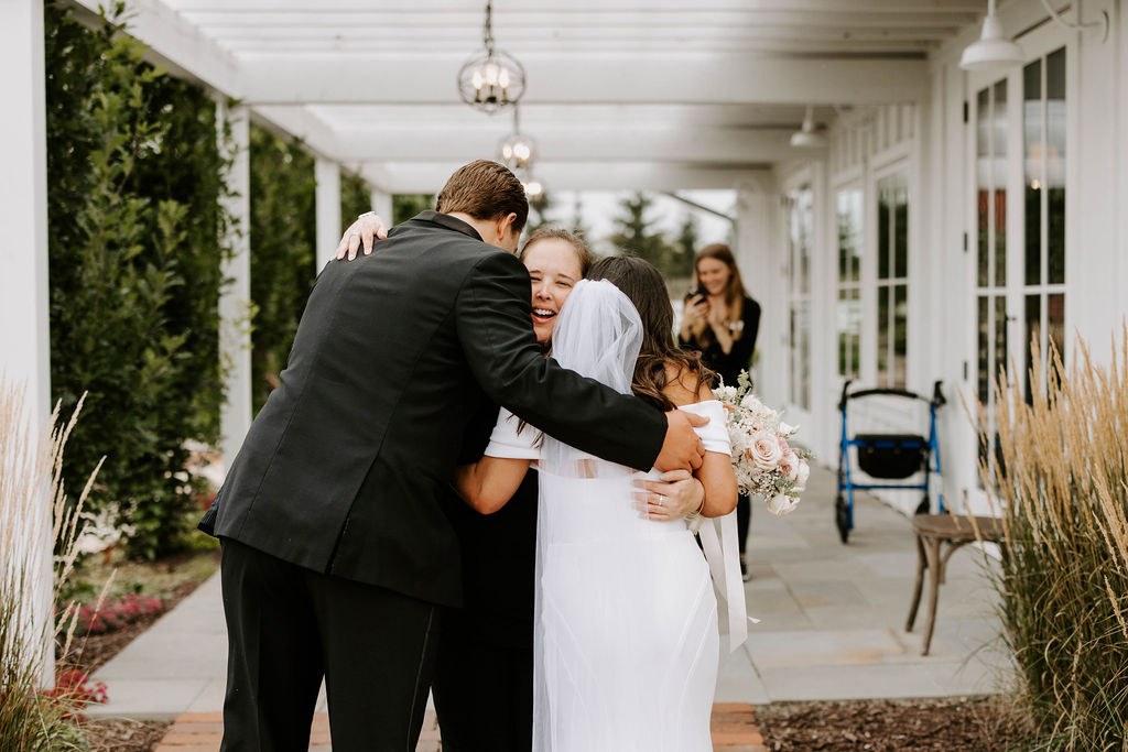 bride-groom-hug-wedding-planner-keyed-up-events-minnesota