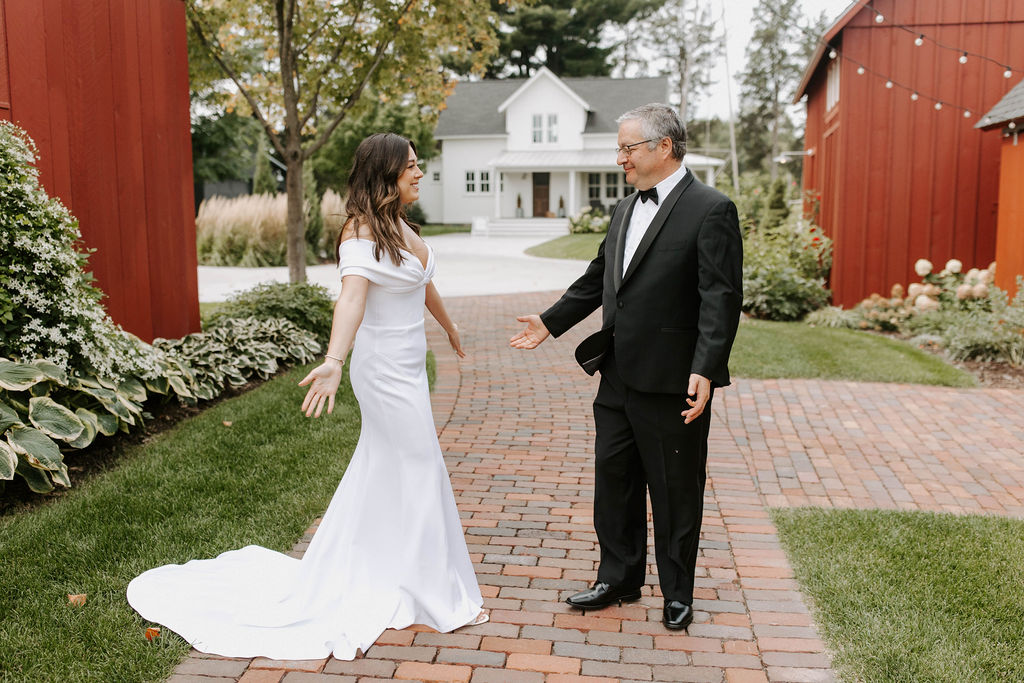 bride-first-look-dad-reaction-outside-barn
