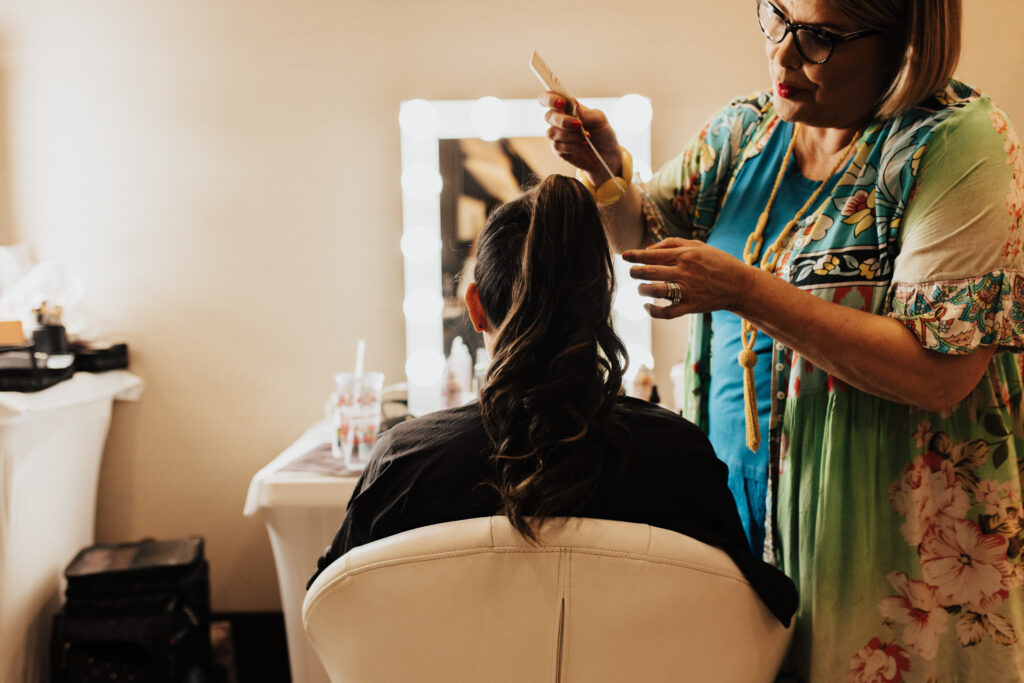 bride-getting-ready-hair-high-ponytail
