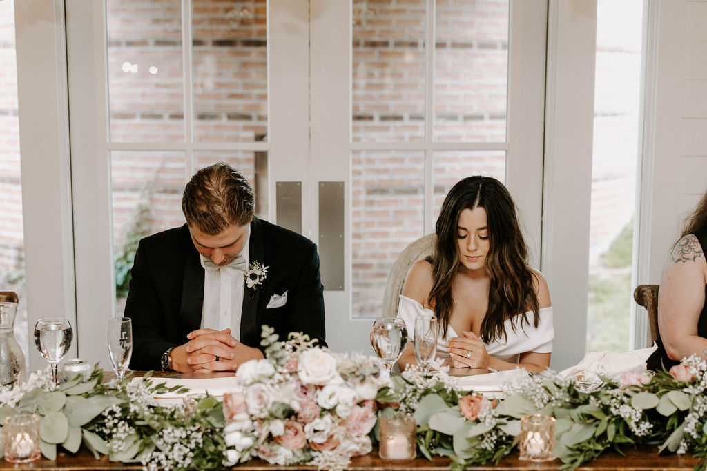 bride-groom-prayer-blessing-wedding-reception-dinner