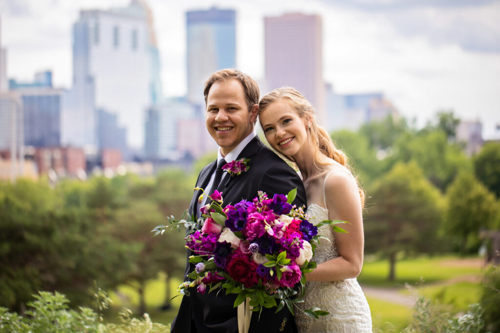 bride-groom-portrait-color-wedding-flowers-pink-purple