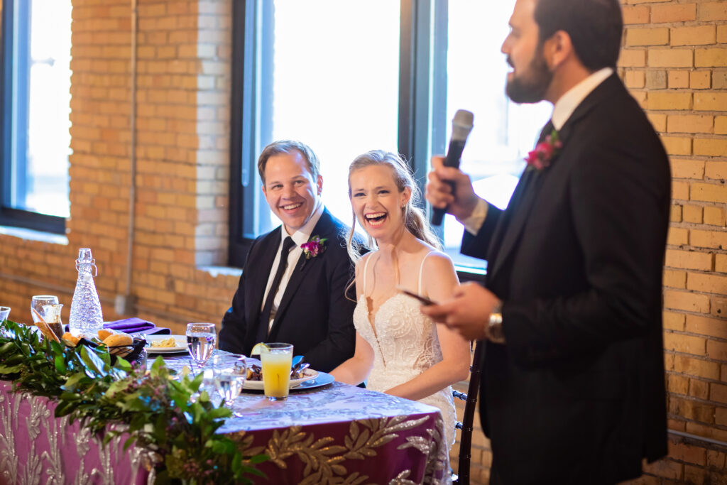 wedding-speeches-toasts-laughing-dinner-colorful-wedding