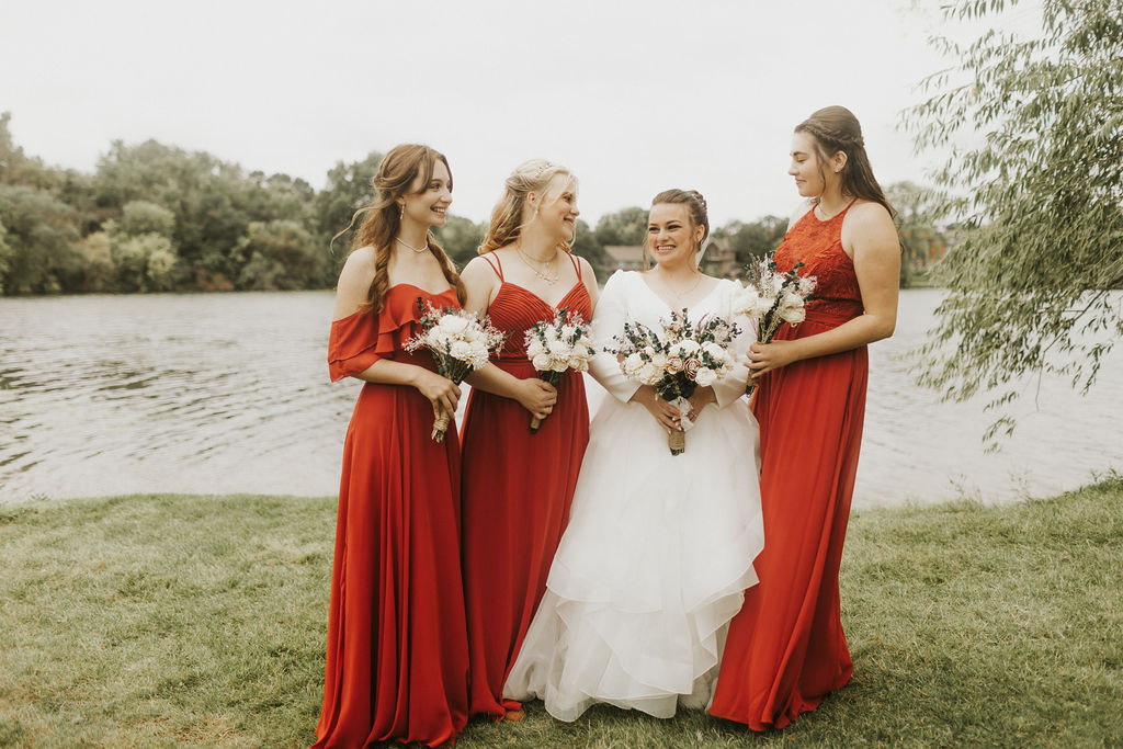 bridesmaids-laughing-candid-burnt-orange-red-dresses