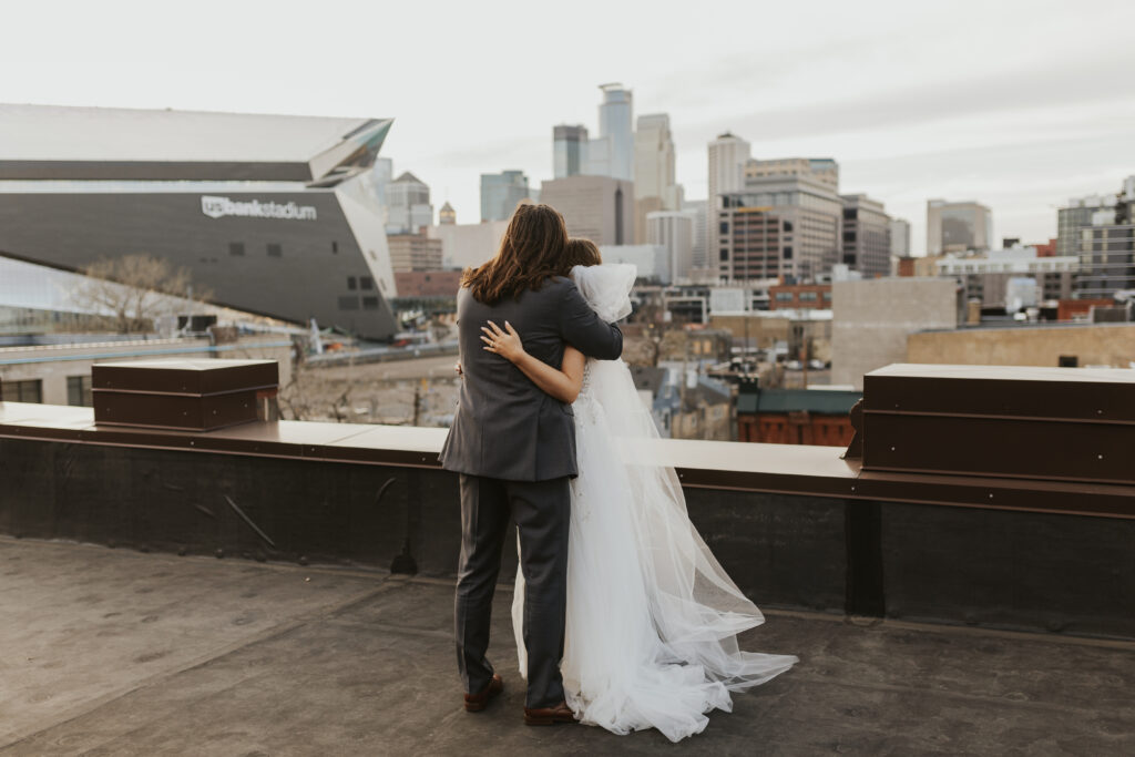 US-bank-stadium-skyline-portraits-bride-groom