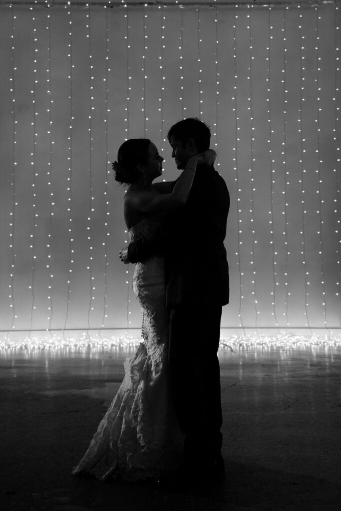 bride-groom-first-dance-romantic-string-light-wall