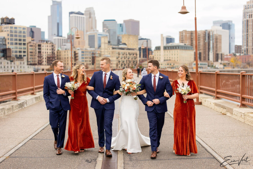 Minneapolis-wedding-party-blue-suits-velvet-orange-dresses