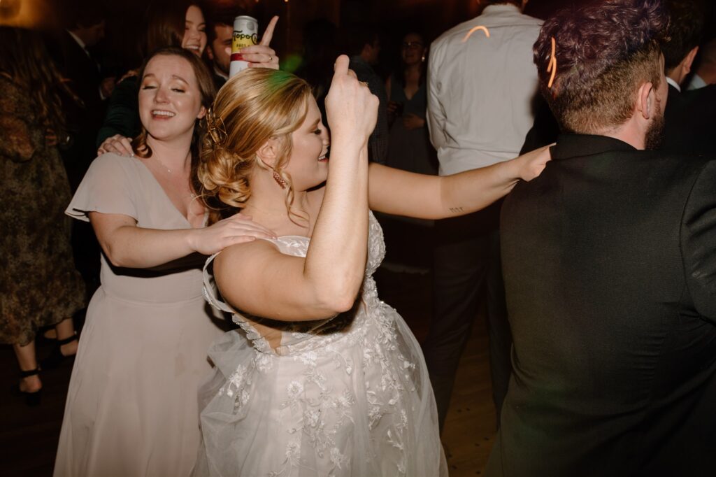 bride in conga line at wedding