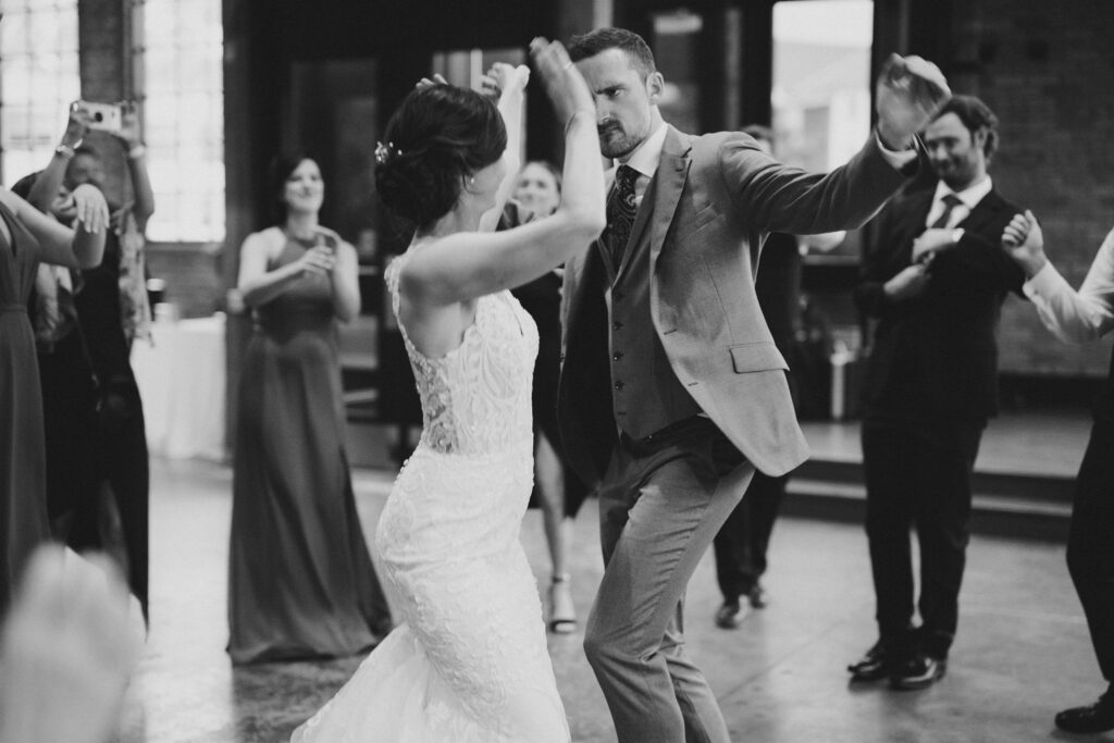 bride and groom on dance floor with DJ Hampster Dance