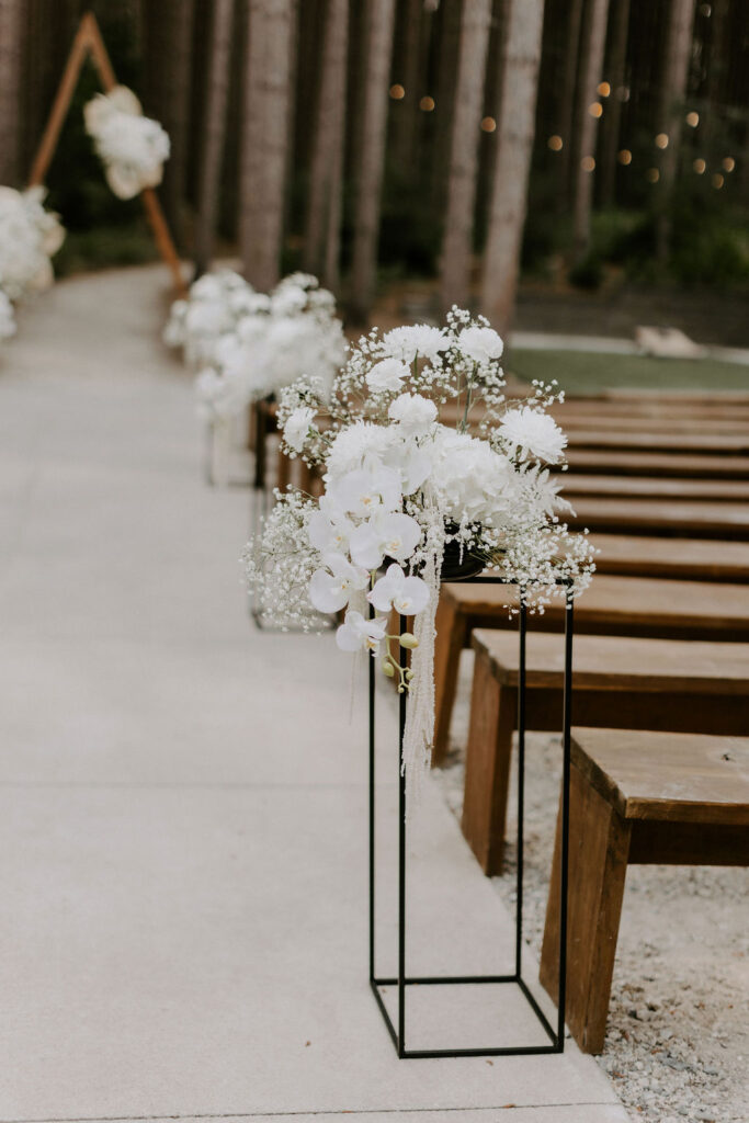 white ceremony aisle arrangements at Pinewood