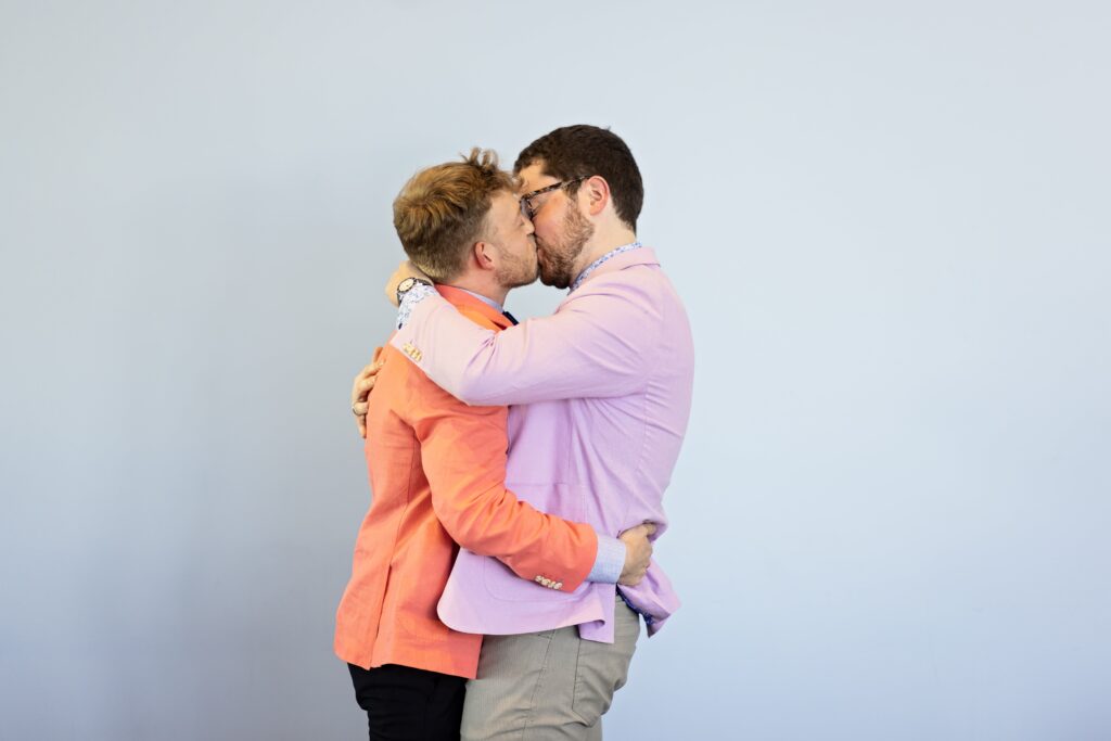 grooms kiss affirmed vows ceremony at walker art center wedding