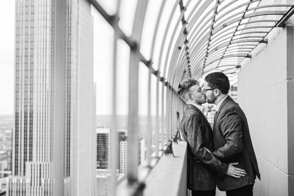 Grooms kissing engagement photo in Minneapolis
