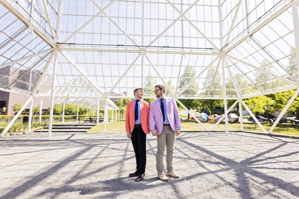 grooms colorful suits outdoor wedding portrait in Minneapolis 