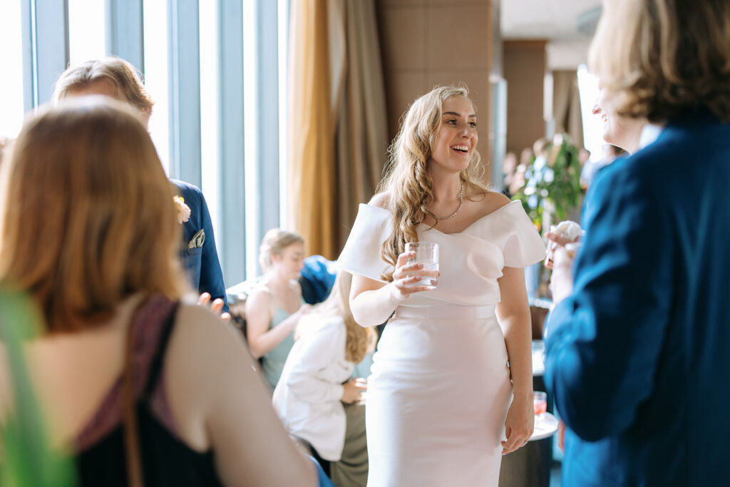 bride socializing at cocktail hour at Downtown Minneapolis Wedding