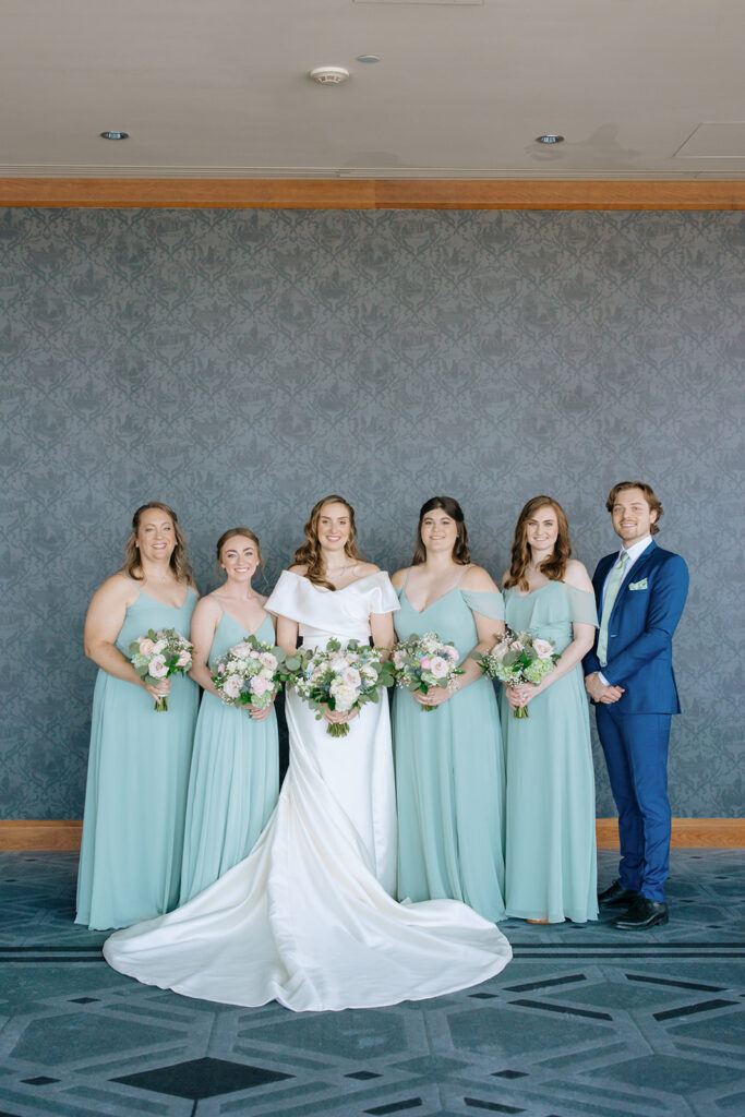 bridesmaids and bridesmaid photo with bride in light mint dresses