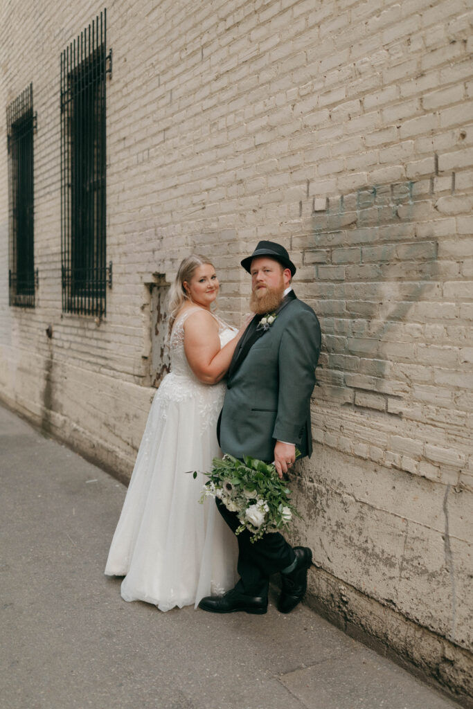 bride and groom alleyway portraits