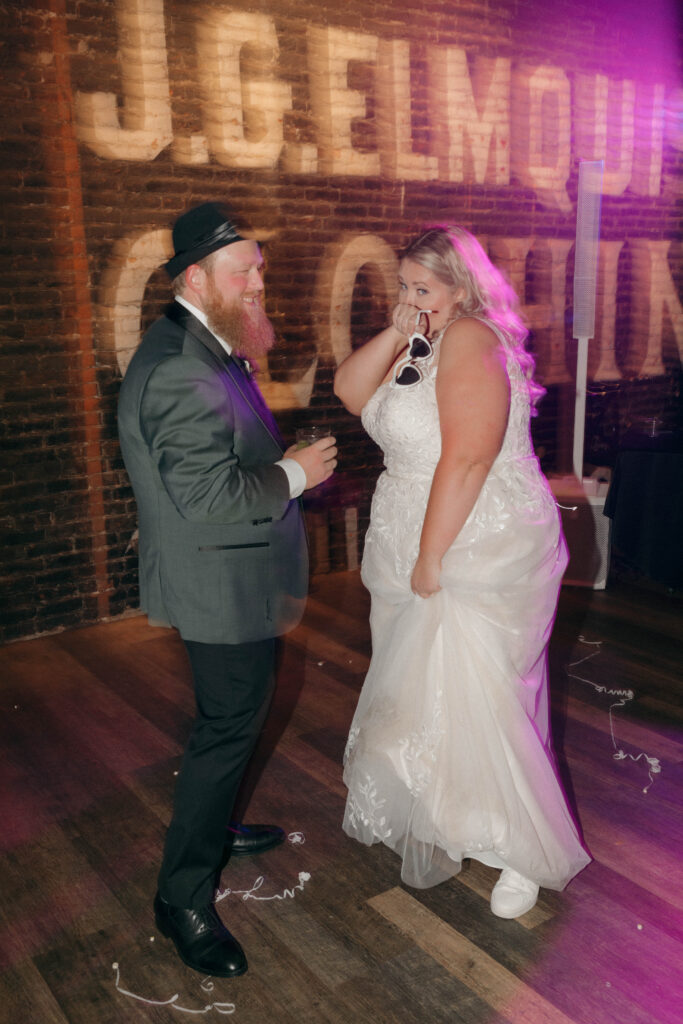 bride and groom on dance floor at intimate wedding