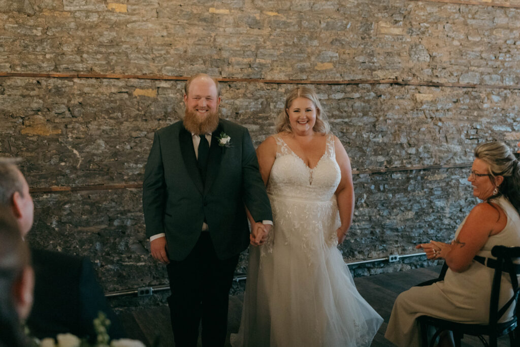 bride and groom recessional at intimate wedding ceremony