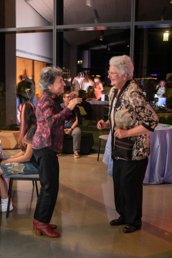 grandmas on dance floor at bell museum with Instant Request