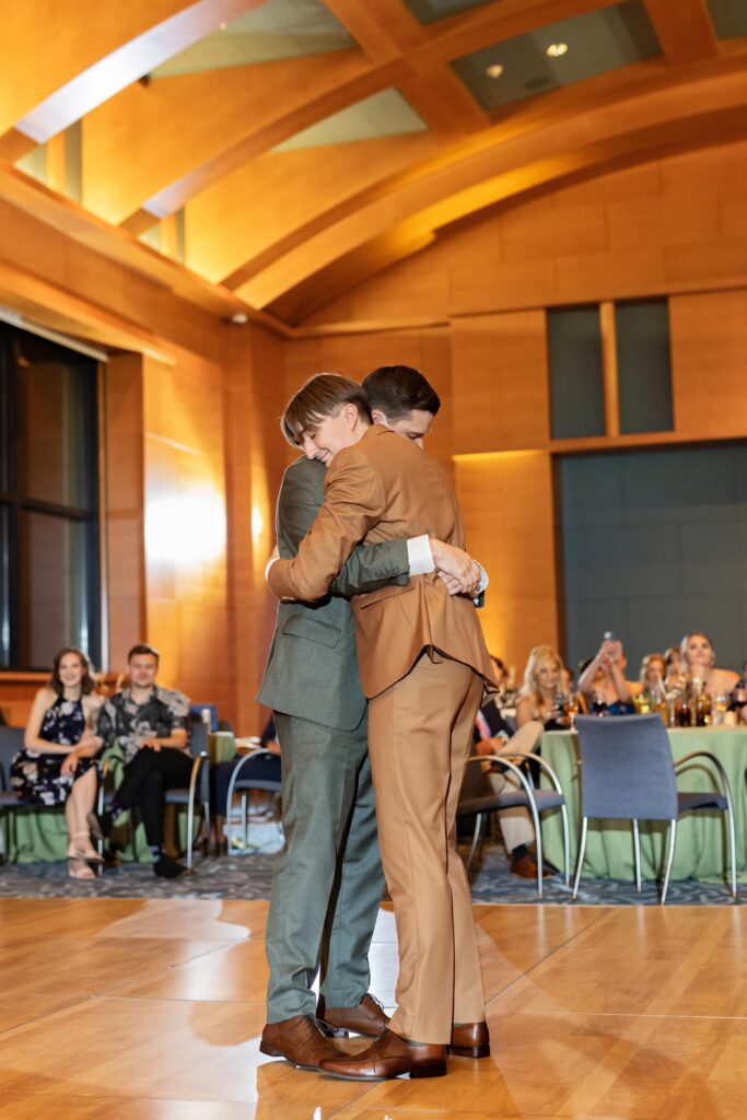 grooms intimate first dance hugging