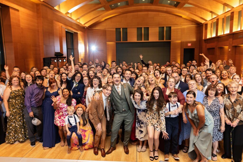 grooms group photo with all wedding guests at Minneapolis Institute of Art