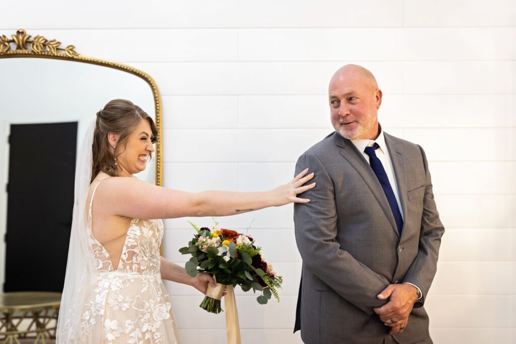 bride first look with dad at Urban Daisy