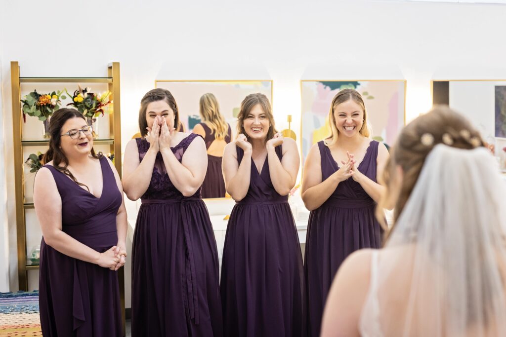 bridesmaids first look reaction with bride