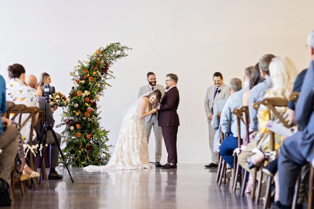 bride and groom fun ceremony laughing 