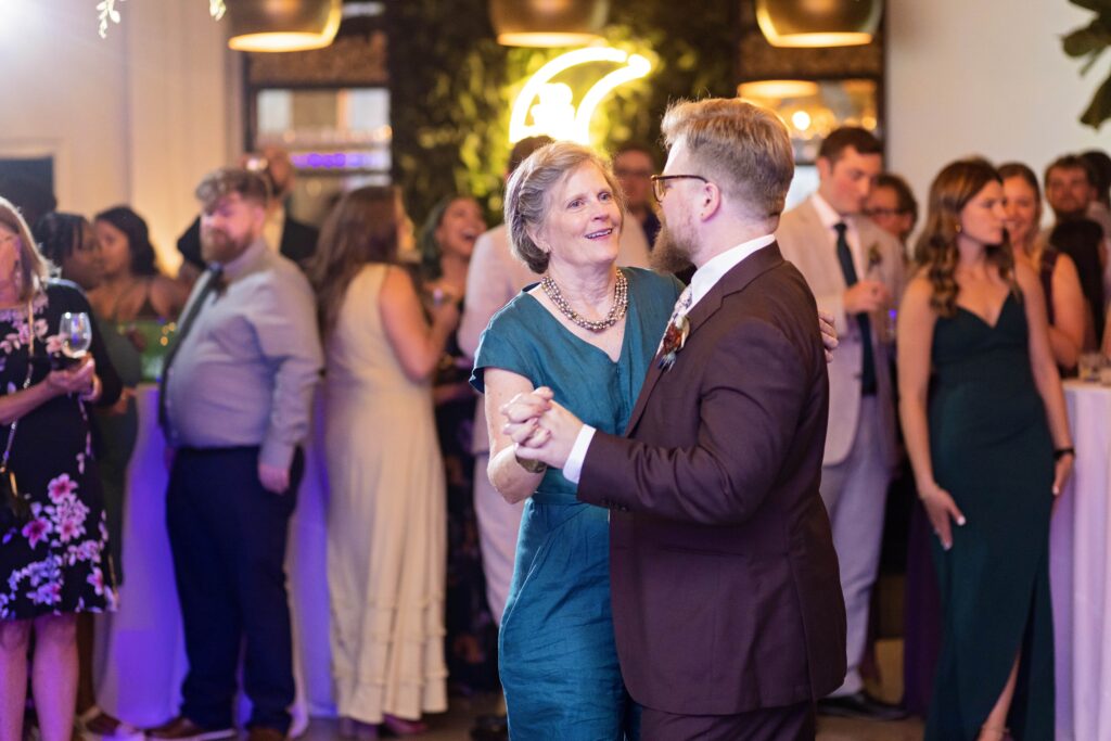 groom and mother first dance at woodland fairy wedding