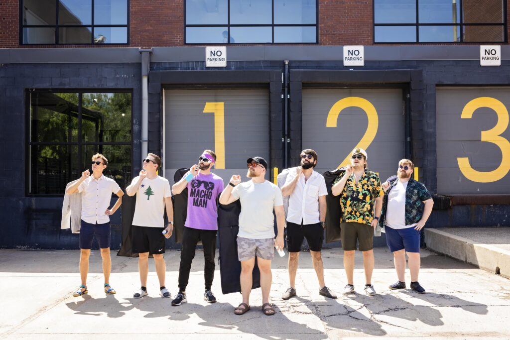 groomsmen fun game day photos at Urban Daisy