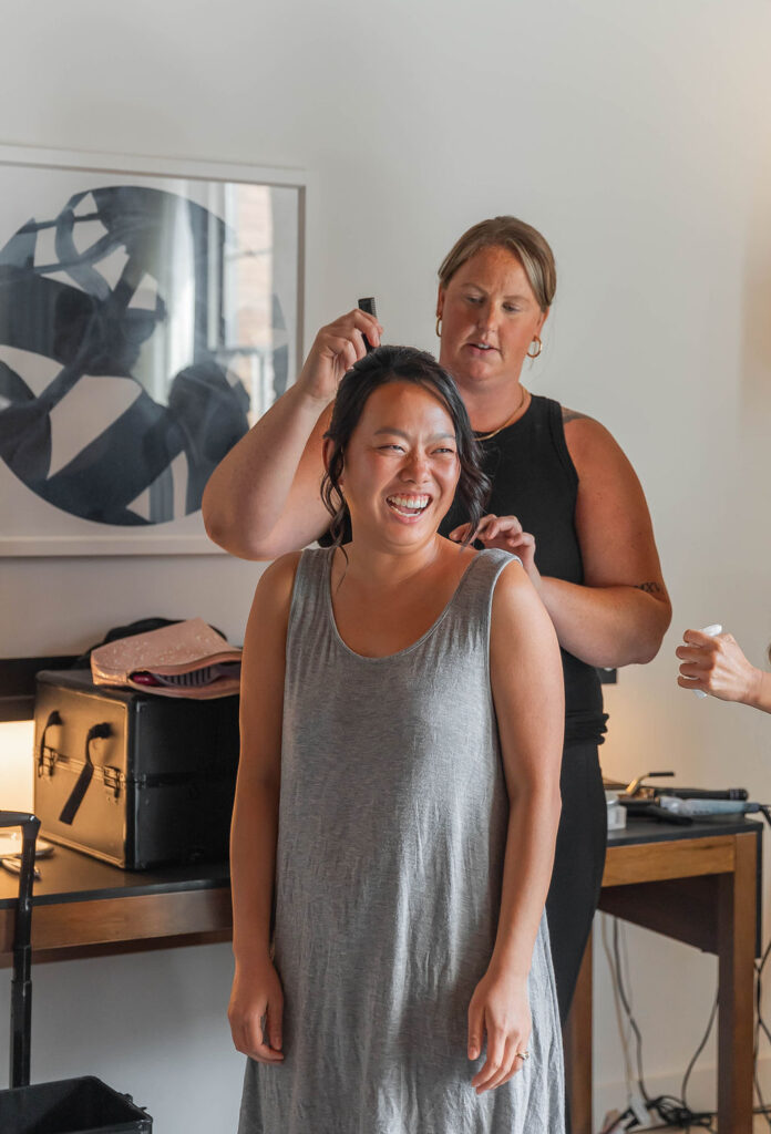 bride getting hair done by I Do Crew in Minneapolis