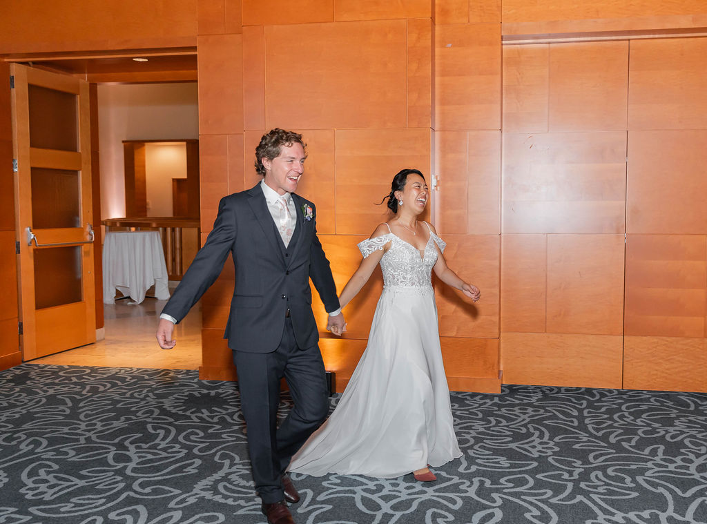 Couple grand entrance at Minneapolis Institute of Art museum wedding