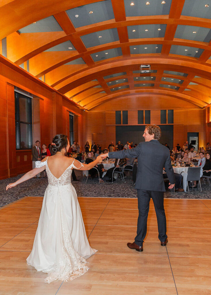 bride and groom fun first dance at Minneapolis Institute of Art museum wedding