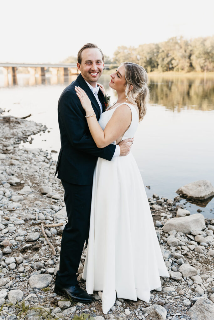 bride and groom portraits near Mississippi River at Leopold’s Mississippi Gardens 