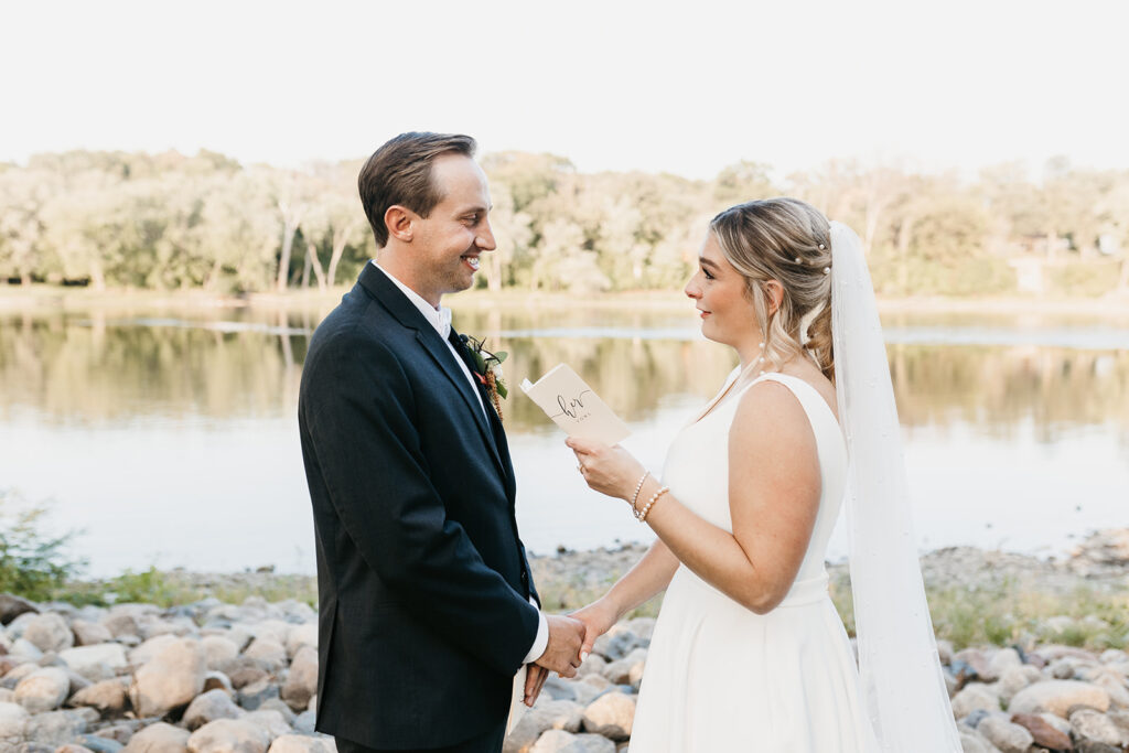 bride and groom share private vows outside at Leopold’s Mississippi Gardens 