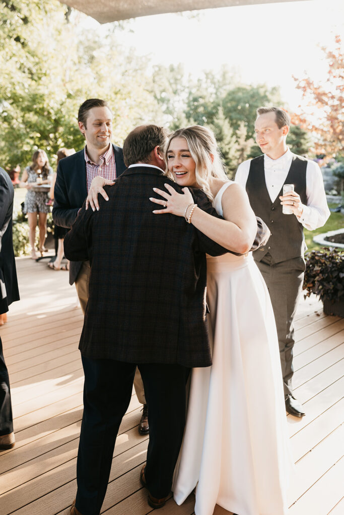 couple socializing with guests during cocktail hour