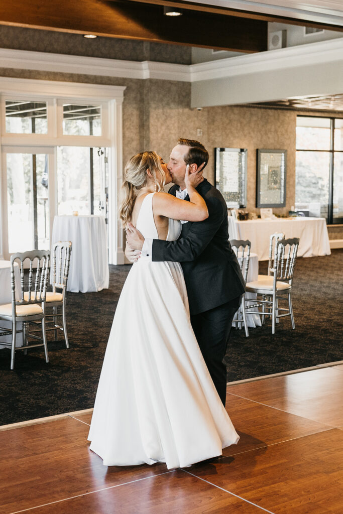 bride and groom reception grand entrance kiss