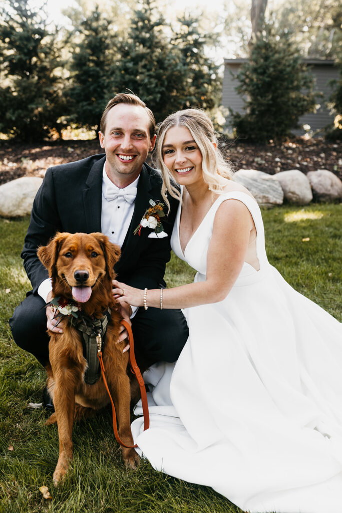 bride and groom portrait with dog 