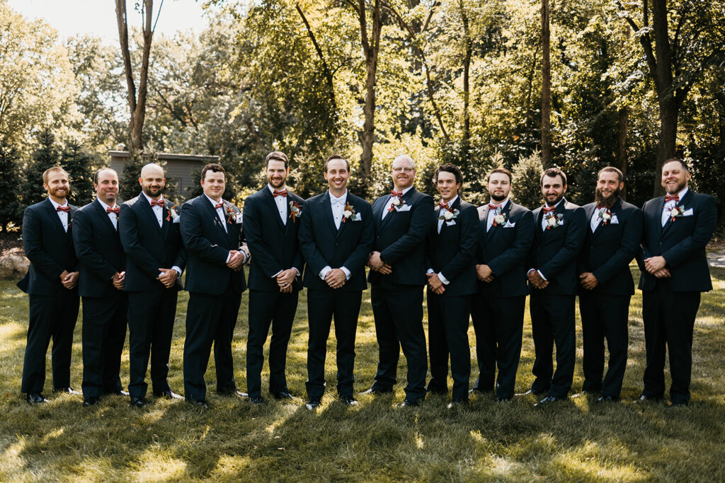 large wedding party groomsmen group photo