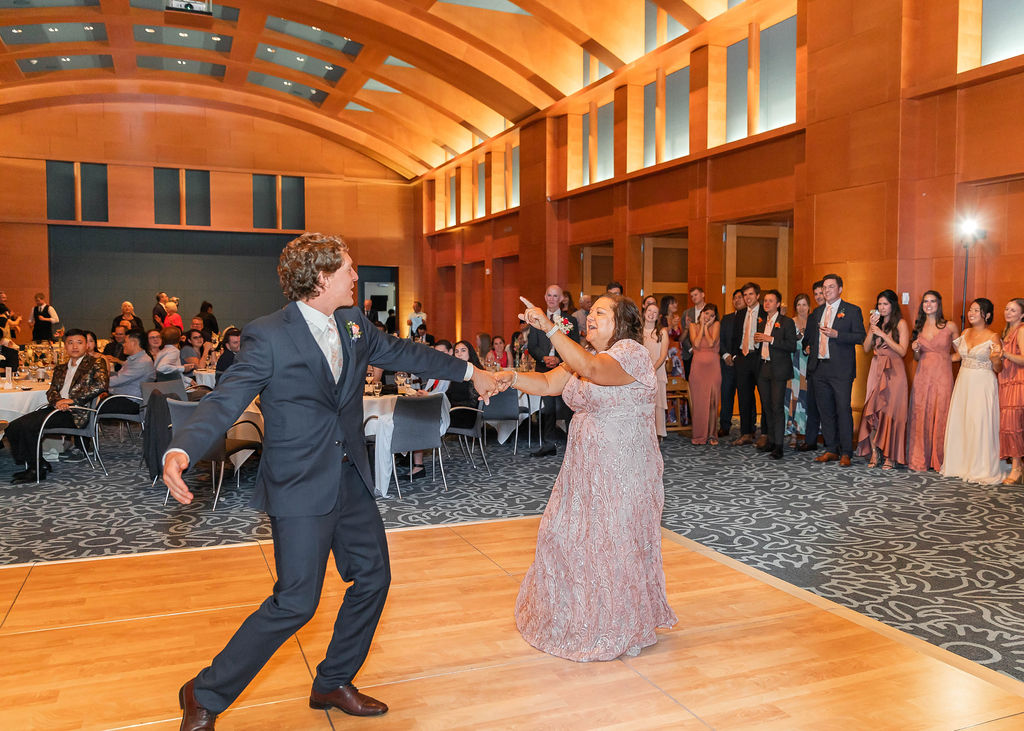 fun mother and groom dance at Minneapolis Institute of Art museum wedding