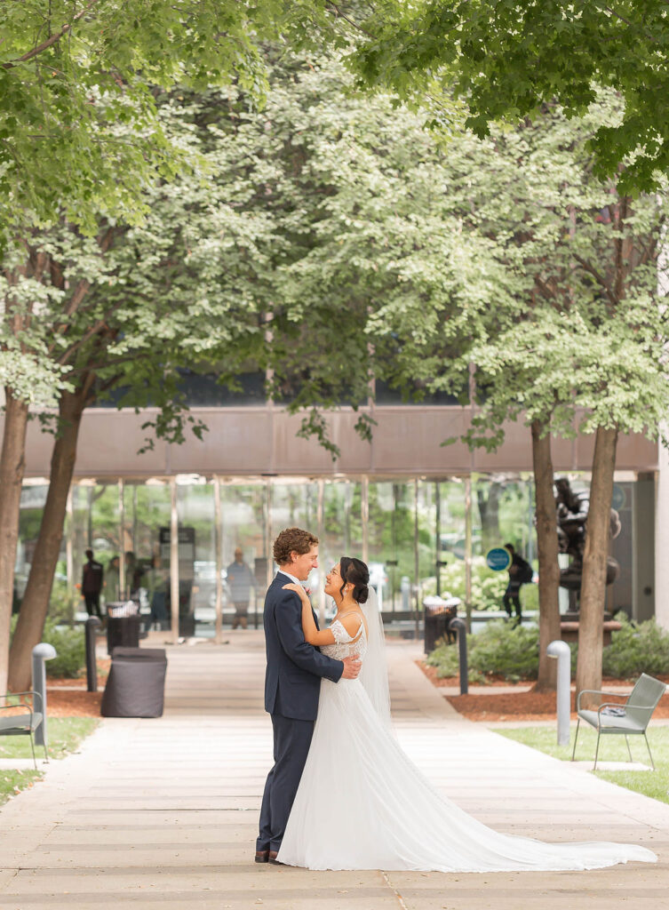 bride and groom wedding portrait outside of art museum